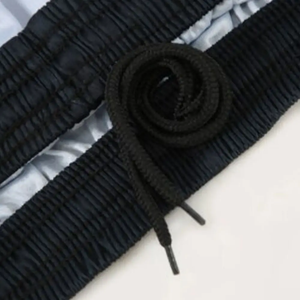 Conjunto de Uniforme de Baloncesto Personalizado de Invierno para Tallas Grandes |   Conjunto de Pantalones Cortos Deportivos con Paneles Diagonales en Negro/Gris |   Ropa Deportiva para Sublimación al por Mayor - Product Image 6