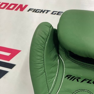 Gants de boxe Muay Thai personnalisés OEM Twins en cuir de vache véritable vert mat, gants de sparring professionnels MMA - Product Image 3