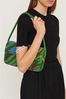 Sac à main de luxe pour femme, orné de perles, design élégant, avec des accents floraux verts, bleus et rouges vibrants, fermeture magnétique, capacité 1L