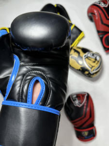 นวมชกมวย อุปกรณ์ศิลปะการต่อสู้แบบกำหนดเอง นวมชกมวย MMA คุณภาพสูง ขายดี นวมชกมวยสำหรับการแข่งขัน - Product Image 3