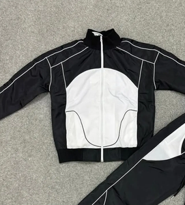 ชุดกีฬาฤดูหนาวแบบใหม่ของ OEM ลายพิมพ์ระบายอากาศได้ดี น้ำหนักเบา สำหรับผู้ชาย ชุดสองชิ้น เสื้อแจ็คเก็ตกันลมและกางเกงวอร์ม - Product Image 2