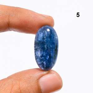 100% ธรรมชาติที่หายากนีออนสีฟ้า Kyanite Cabochons เครื่องประดับแท้ทําอัญมณีขายในราคาขายส่งราคาถูกจํานวนมาก OEM - Product Image 1