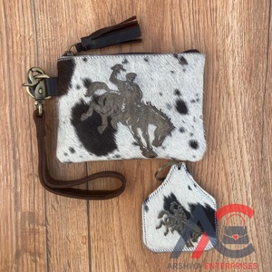 ชุดรวมพวงกุญแจหนังวัวแบบตะวันตกพร้อมสายคล้องมือสลักด้วยเลเซอร์กระเป๋ามีพู่หนังวัวพร้อมพวงกุญแจแกะสลักด้วยเลเซอร์ - Product Image 1