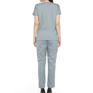 Uniforme médico unisex con parte superior y pantalones de corte holgado, material transpirable diseñado para comodidad, flexibilidad y profesionalismo. - Product Image 6