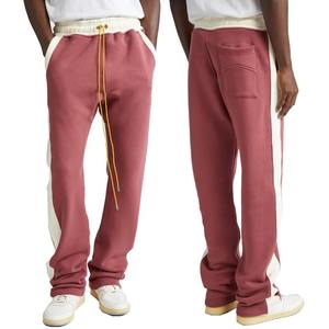 กางเกงวอร์มผู้ชายผ้าฝ้าย/โพลีเอสเตอร์ลำลองผ้าคอตตอนลายทางตัดปะสีเหลืองมีเชือกผูกปากบานแบบตรง - Product Image 1