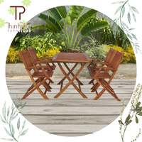 Ensemble table et chaises de salle à manger en bois d'acacia au design moderne, idéal pour jardin, extérieur, salon, cour et hôtel