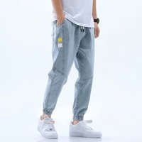 Jeans pour hommes à poches décontractées en neuf points, coupe droite et lâche, adoucissant, vente en gros