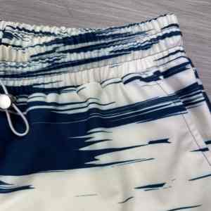 2025 vente en gros hommes longueur genou Baggy Shorts OEM personnalisé Streetwear sublimation imprime 100% coton tissé Logo avant Position - Product Image 4