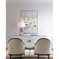 Table d'appoint moderne classique avec plateau en marbre crème torsadé et base en aluminium blanc argenté, style Art Déco, fabrication artisanale Nsons Home
