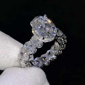 Anillo de compromiso de eternidad de diamante de moissanita VVS de corte ovalado de 2ct, banda de boda de lujo de plata 925 para mujer, regalo de aniversario - Product Image 1