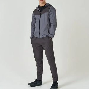 Ensemble de survêtement pour homme, coupe-vent, imperméable, respirant, en polyester et coton, nouvelle arrivée, durable, à capuche, uni, OEM - Product Image 1