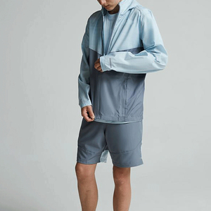 100% poliéster hombres deportes reflectantes impermeable a prueba de viento Jogging traje deportes doble bolsillo rompevientos Color de contraste - Product Image 2