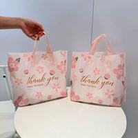 Sacs en plastique MU 3 fleurs pour remerciement, sacs à main, sacs cadeaux en plastique, sacs d'emballage pour vêtements, sacs en plastique avec poignée, vente en gros