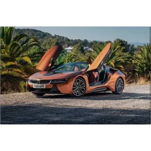 Impression sur toile Fida Orange BMW i8 avec portes ouvertes parmi les palmiers - Product Image 6