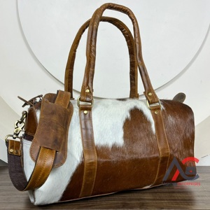 กระเป๋าเดินทางหนังวัวลายตะวันตกกระเป๋าหลายใช้ผมบนหนังขนกระเป๋าแฮนด์เมดกระเป๋าเดินทาง Unisex ขนาดใหญ่หลายใช้ - Product Image 1