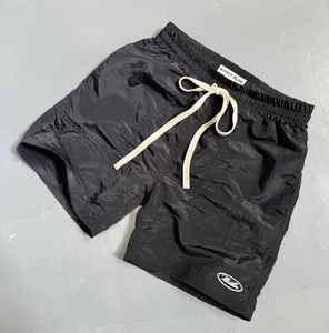 กางเกงขาสั้นวิ่งของผู้ชายฤดูร้อนพร้อมโลโก้ที่กำหนดเองพิมพ์ปิดเอวยางยืดสำหรับยิมออกกำลังกายนักรบสำหรับวัวสายคล้องกระเป๋า - Product Image 4