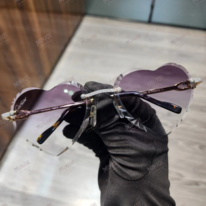 Blue Heart-Shaped Rimless Sunglasses with Diamond Bridge Stylish Romantic Eyewear with Luxury Details and Cut-Edge Lenses - Product Image 3