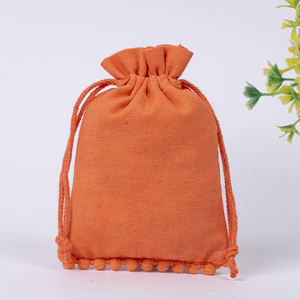 Pochette d'emballage de bijoux collier en coton avec logo personnalisé Sac indien à cordon orange fait à la main réutilisable vente en gros - Product Image 1