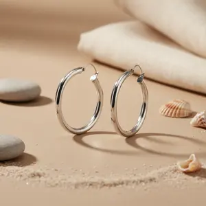 Boucles d'oreilles créoles rondes simples en argent pour femmes, design à clous tendance - Product Image 1