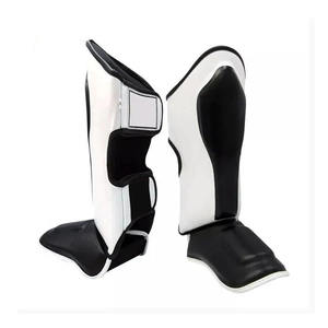 Eagle View Protège-tibias de Muay Thai et Kickboxing avec protection intégrale du cou-de-pied élastique en PU pour l'entraînement de Boxeo et le maintien au chaud des jambes - Product Image 1