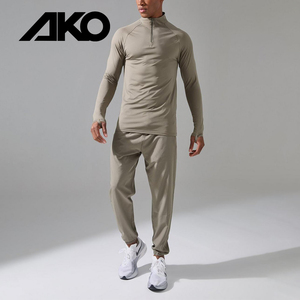 Conjunto Deportivo de 2 Piezas Personalizado para Gimnasio, Reflectante, para Entrenamiento, Running, Cortavientos, Pantalones Deportivos de Nailon para Hombre - Product Image 1