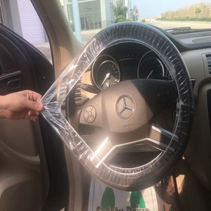 <span class=keywords><strong>Couvre</strong></span> <span class=keywords><strong>volant</strong></span> automatique en <span class=keywords><strong>plastique</strong></span> <span class=keywords><strong>jetable</strong></span> universel - Product Image 6