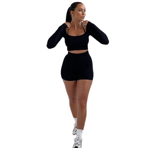 Gran oferta 2025, traje deportivo de dos piezas para mujer, Top corto ajustado de punto acanalado, pantalones cortos de manga larga, diseño Halter sólido, botón 6XL de invierno - Product Image 4