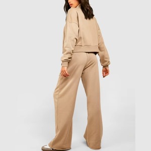 Conjunto Deportivo de Dos Piezas para Mujer, Top Corto con Cremallera y Pantalones Jogger de Pierna Ancha, Diseño Moderno 2025 - Product Image 2