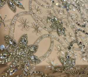 Tissu en dentelle élégant avec des perles et des détails brodés créés pour améliorer les conceptions Lehenga pour des fonctions spéciales - Product Image 2