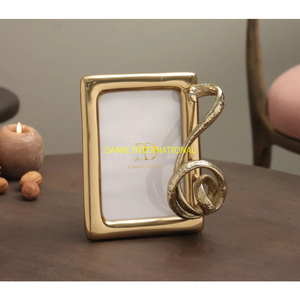 Gold Metal Photo <b>Frame</b> with Decorative Abstract Leaf Design Modern Home Decor Tabletop <b>Frame</b> for Gift and Office Decoration Use - Product Image 4