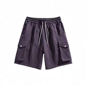 Pantalones cortos deportivos activos para hombre de poliéster de verano a precio barato de fábrica, pantalones deportivos informales con logotipo personalizado de Color sólido, teñidos lisos - Product Image 4