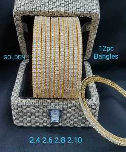 Premium Designer Star Cut American Diamond 12 Brazaletes Set Brazaletes de lujo Perfecto para ropa de fiesta - Product Image 2