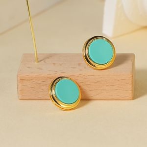 Pendientes de tuerca redondos turquesa Accesorio elegante y elegante con estilo geométrico clásico con bordes dorados - Product Image 1