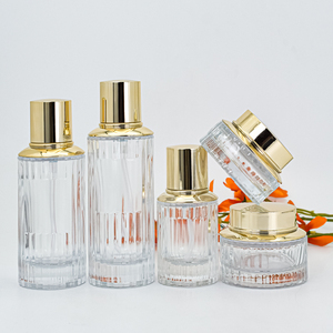 Ensemble <span class=keywords><strong>d</strong></span>'emballages cosmétiques en verre côtelé, verre transparent avec bouchon doré, contenants rechargeables pour sérum et lotion, vente chaude - Product Image 2