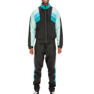 Ensemble de survêtements coupe-vent à la mode pour hommes et femmes Service OEM ODM Vêtements de sport étanches 2 pièces avec logo personnalisé - Product Image 1