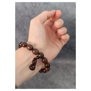 Braccialetto di legno perle di preghiera 17 pezzi Stress perle di preghiera Kuka albero diventa nero quando tirato con elastico - Product Image 4
