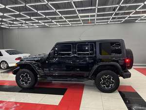 Clean 2023 Jeep Wrangler Rubicon 4XE 2.0 Turbo Hybrid Utilisé Options complètes Boîte de vitesses automatique Lumière Intérieur Caméra arrière ACC Cruise - Product Image 5