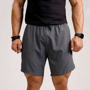 Pantalones cortos deportivos para correr transpirables con ribetes para hombre con cordón de diseño personalizado 2026 - Product Image 1