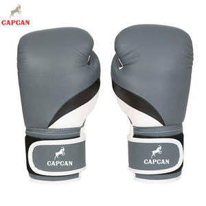 Gants de boxe professionnels pour l'entraînement et les séances de sparring, gants de boxe haut de gamme avec une protection contre les chocs élevée et un confort optimal - Product Image 1
