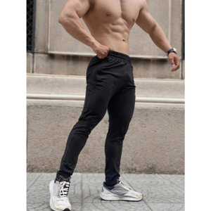 SP05, pantalones ligeros de algodón para correr, absorbe el sudor rápido con sensación suave para una movilidad cómoda y deportiva, disponible en negro y blanco - Product Image 2