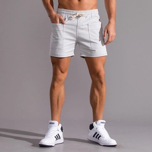 Nuevo estilo de verano para hombres Waffger moda casual deportes al aire libre estilo de playa pantalones cortos con cordón de color sólido - Product Image 5
