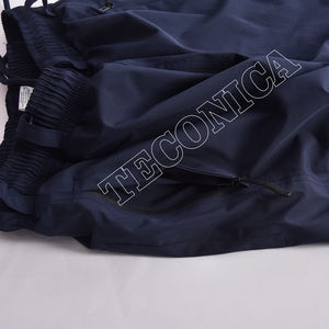 Pantalones de esquí de nieve unisex azul marino impermeables a prueba de viento con bolsillos de carga con cremallera en la rodilla y parte inferior elástica - Product Image 3