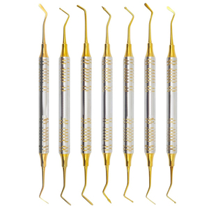 Kit de Instrumentos para Obturaciones Dentales de Composite, 7 Piezas, Acero Inoxidable con Recubrimiento de Plasma Dorado, para Amalgama, Ionómero de Vidrio y Restauraciones - Product Image 1