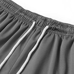 Pantalones cortos de baloncesto de verano OEM Dynamics de secado rápido de poliéster para Hombre Pantalones cortos de malla con estampado de logotipo personalizado negro con bolsillos - Product Image 4