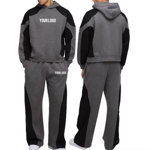 Ensemble survêtement homme color block, style streetwear, coupe ample et oversize, en molleton épais, avec pantalon de survêtement évasé et ample et sweat à capuche, uni - Product Image 1