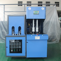 Machine de soufflage semi-automatique compacte PET/PC à 2 cavités avec moteur PLC et pompe, écologique et efficace pour la production de bouteilles et de bocaux en plastique