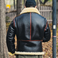 Veste de moto en cuir véritable pour homme, en peau de mouton, avec fermeture éclair, capuche et doublure en fourrure, pour l'hiver
