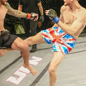 กางเกงมวยไทยโลโก้สั่งทำ คุณภาพสูง สวมใส่สบาย ระบายอากาศดี กางเกงมวยไทยสำหรับการต่อสู้ ขายส่ง - Product Image 4