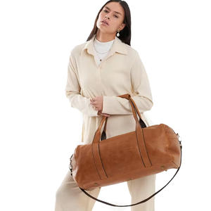 Bolsa de viaje de cuero PU de lujo personalizada de gama alta Bolsa de equipaje de viaje de fin de semana - Product Image 1