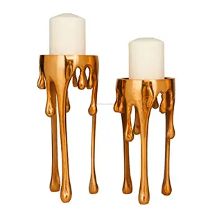 Suporte de vela de pilar de alumínio, polido e brilhante, produtos tendência, com gotejamento, pernas projetadas para decoração de casa
